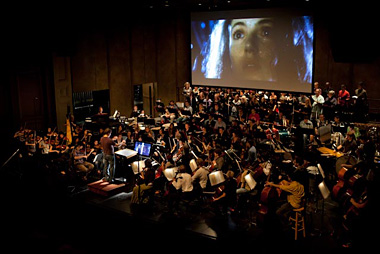 David Newman conducts the American Youth Symphony in a rehearsal for Goldsmith's music from <i>Legend</i>. (Photo by Philip Holahan.)