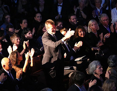 Richard Bellis takes bow from audience