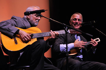Guitarist Oscar Castro-Neves and song-and-dance man Tony Danza perform the Norman Gimbel-Michel Legrand hit 