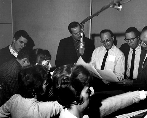 Ray Charles (in white shirt) instructs choir