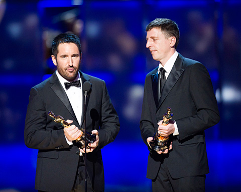 Trent Reznor and Atticus Ross accept the Oscar for Best Score.