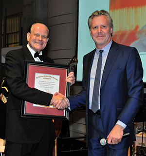 Honoree Conrad Pope with Warner Bros. Music president Paul Broucek