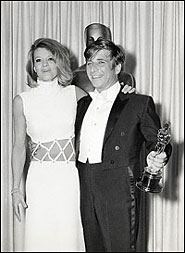With Angie Dickinson, receiving Oscar for 