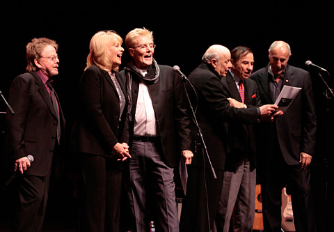 (Left to right) Paul Williams, Ilene Graff, Bob Crewe, Charles Fox, Richard Sherman and Jeff Barry sing Crewe\'s hit 