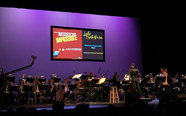Composer Michael Giacchino conducts Lalo Schifrin's original arrangement to the theme from 'Mission: Impossible.'